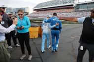 Denny Hamlin (R) and Ross Chastain after the Bank of America ROVAL 400. Source: Getty
